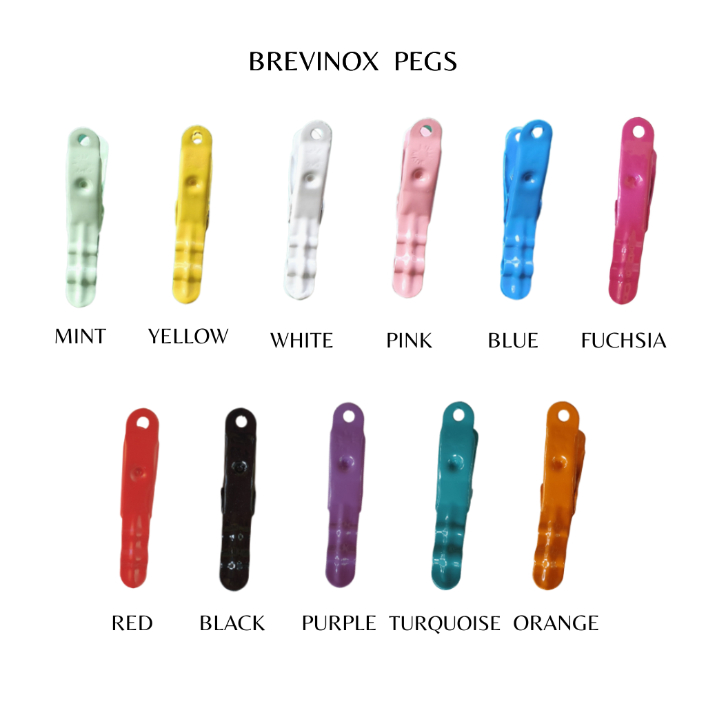 Colour Brevinox Stainless Steel pegs - colour range for single colour stainless steel peg sets. Lifetime guarantee. Mint peg, yellow peg, white peg, pink peg, blue peg, orange peg, black peg, red peg, purple peg, Turquoise-Jade Peg. Fuchsia Pink Peg, Brevinox colour peg sets exclusive to Twizzle Designs.