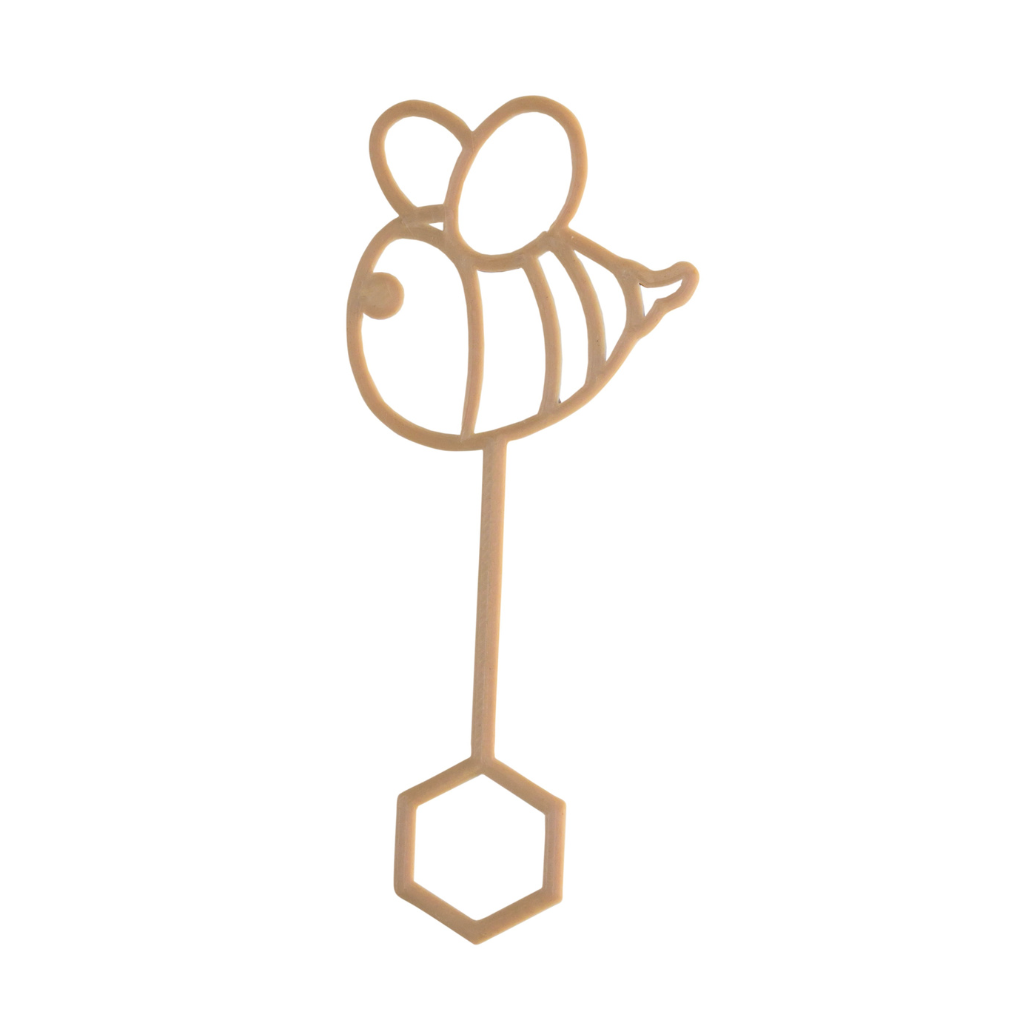 Young child with bee shaped bubble wand blowing bubbles. Australian made, all natural bubble wand which is biodegradable. Spark your child’s imagination with nature toys.