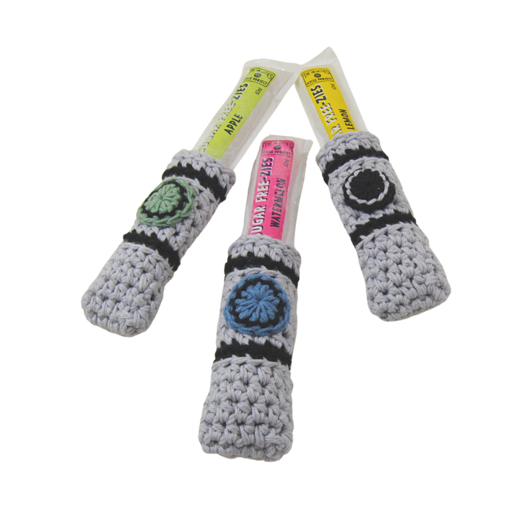 Ice stick covers to keep kids happy - no more cold hands with ice sticks. 2 designs - Sci-Fi Sabres and Mermaid tails. Handcrafted in Queensland from 100% Australian cotton from the Bendigo Mill. Australian designed, made and owned.