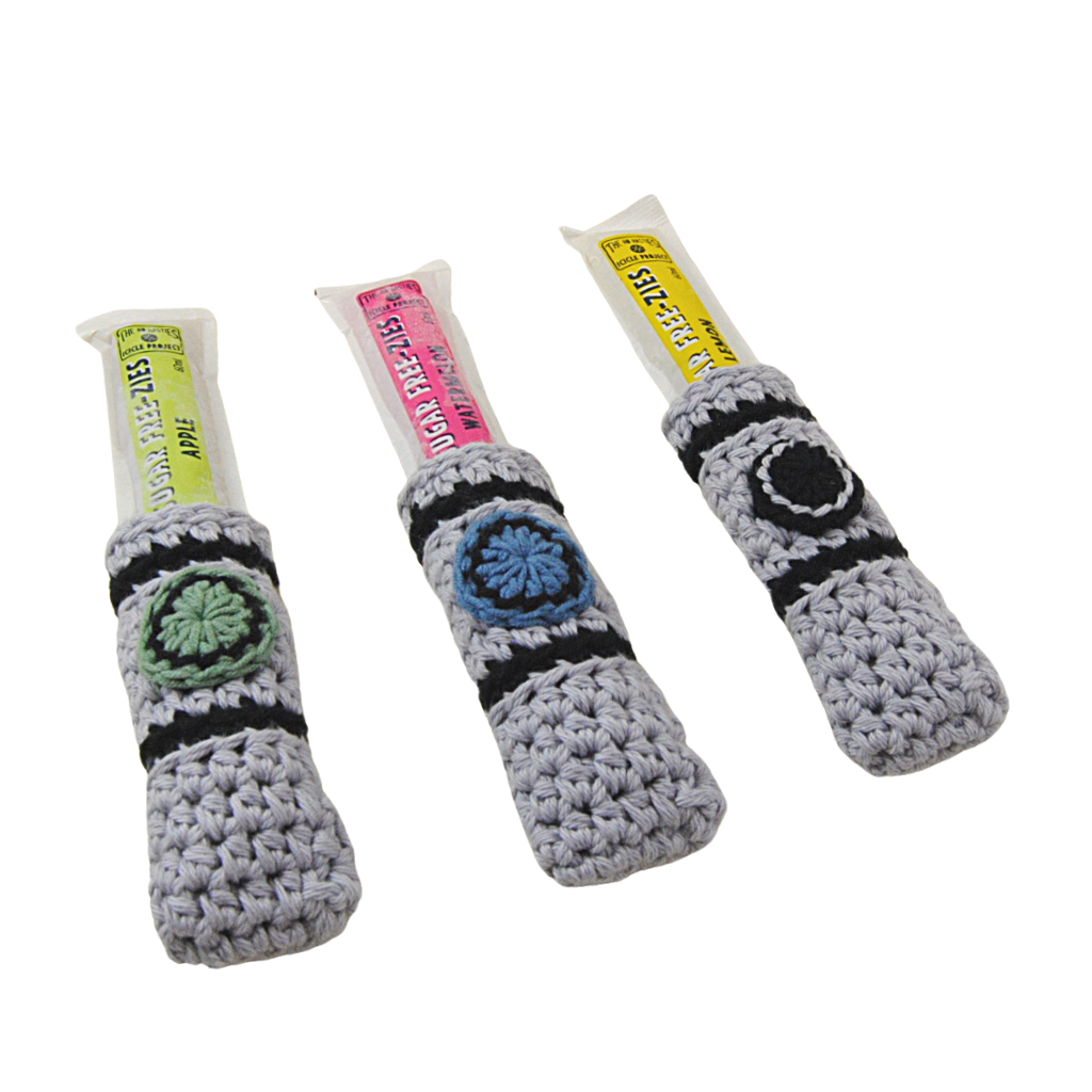 Ice stick covers to keep kids happy - no more cold hands with ice sticks. 2 designs - Sci-Fi Sabres and Mermaid tails. Handcrafted in Queensland from 100% Australian cotton from the Bendigo Mill. Australian designed, made and owned.