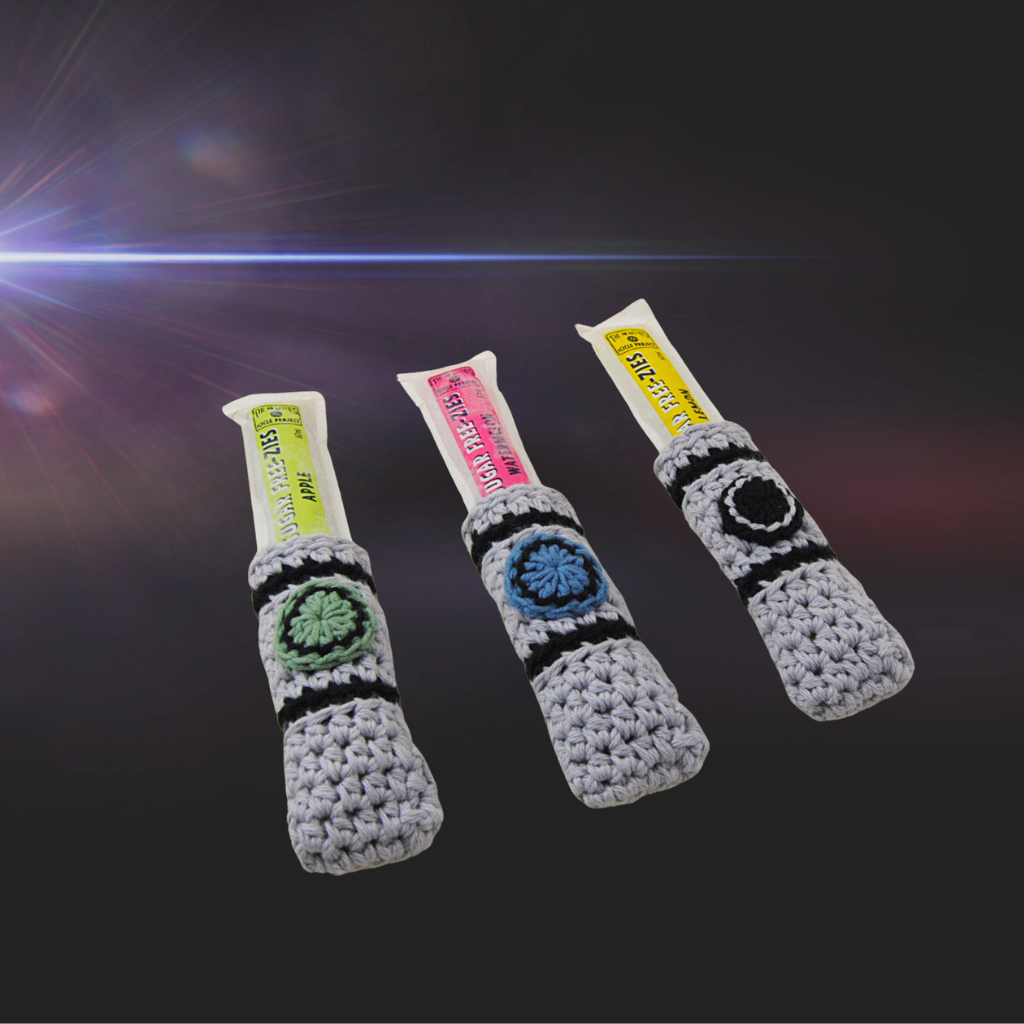 Ice stick covers to keep kids happy - no more cold hands with ice sticks. 2 designs - Sci-Fi Sabres and Mermaid tails. Handcrafted in Queensland from 100% Australian cotton from the Bendigo Mill. Australian designed, made and owned.
