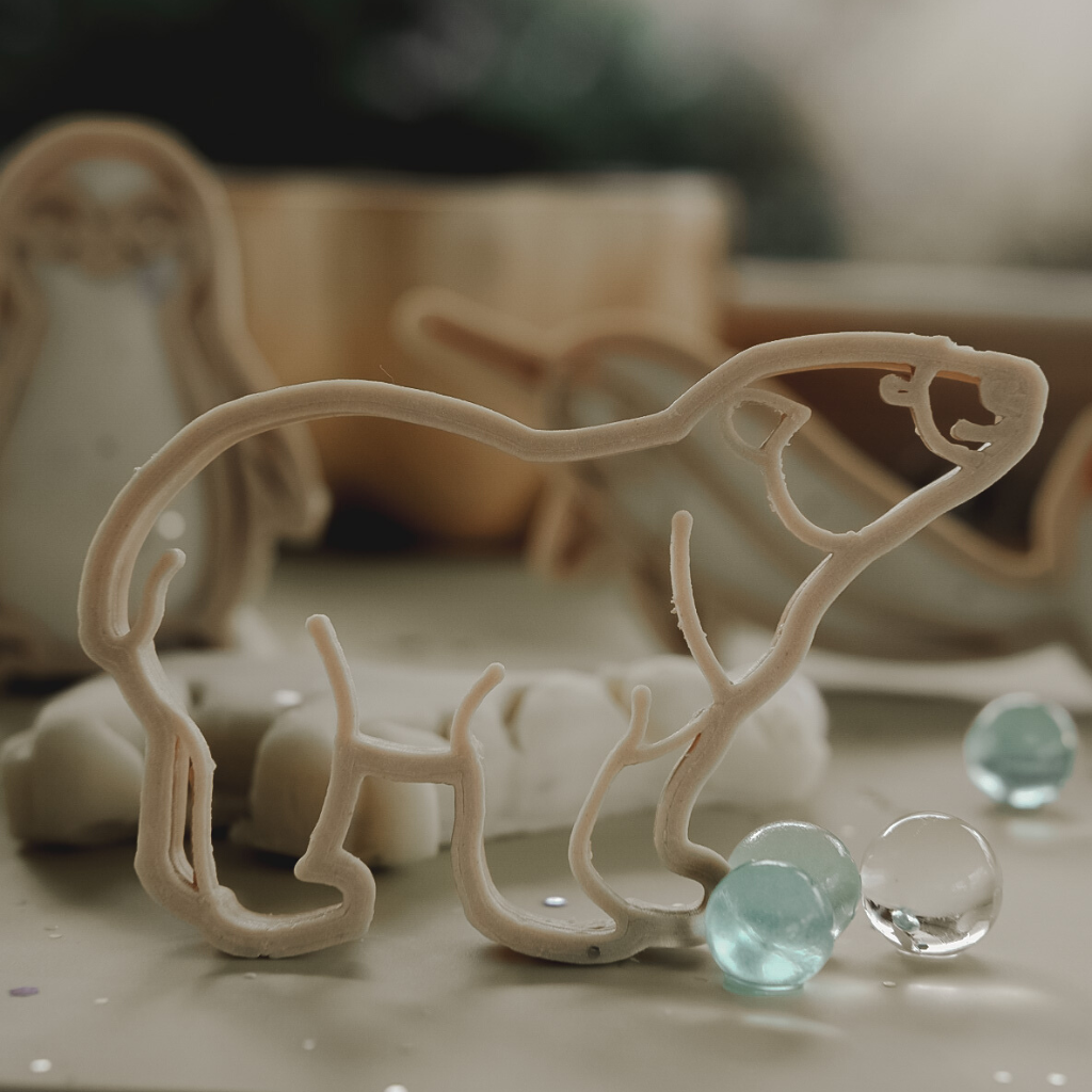 Young child using the Arctic Eco Cutter set to discover the Arctic animals. Australian made, all natural Eco Cutters which are biodegradable. Learning and fun from Kinfolk Pantry.