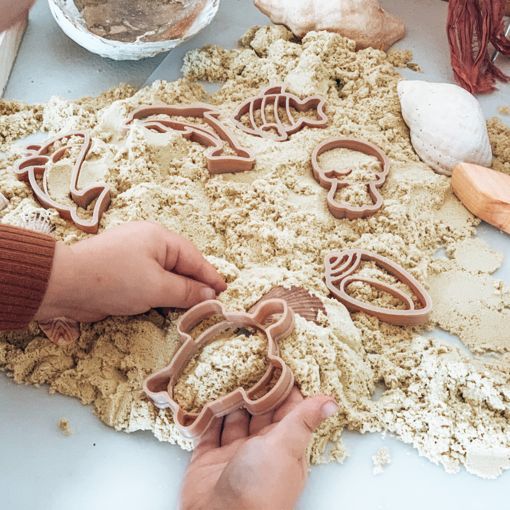 Young child using the Under the Sea Eco Cutter set to discover the oceans and marine life. Australian made, all natural Eco Cutters which are biodegradable. Spark your child’s imagination with nature toys from Kinfolk Pantry.