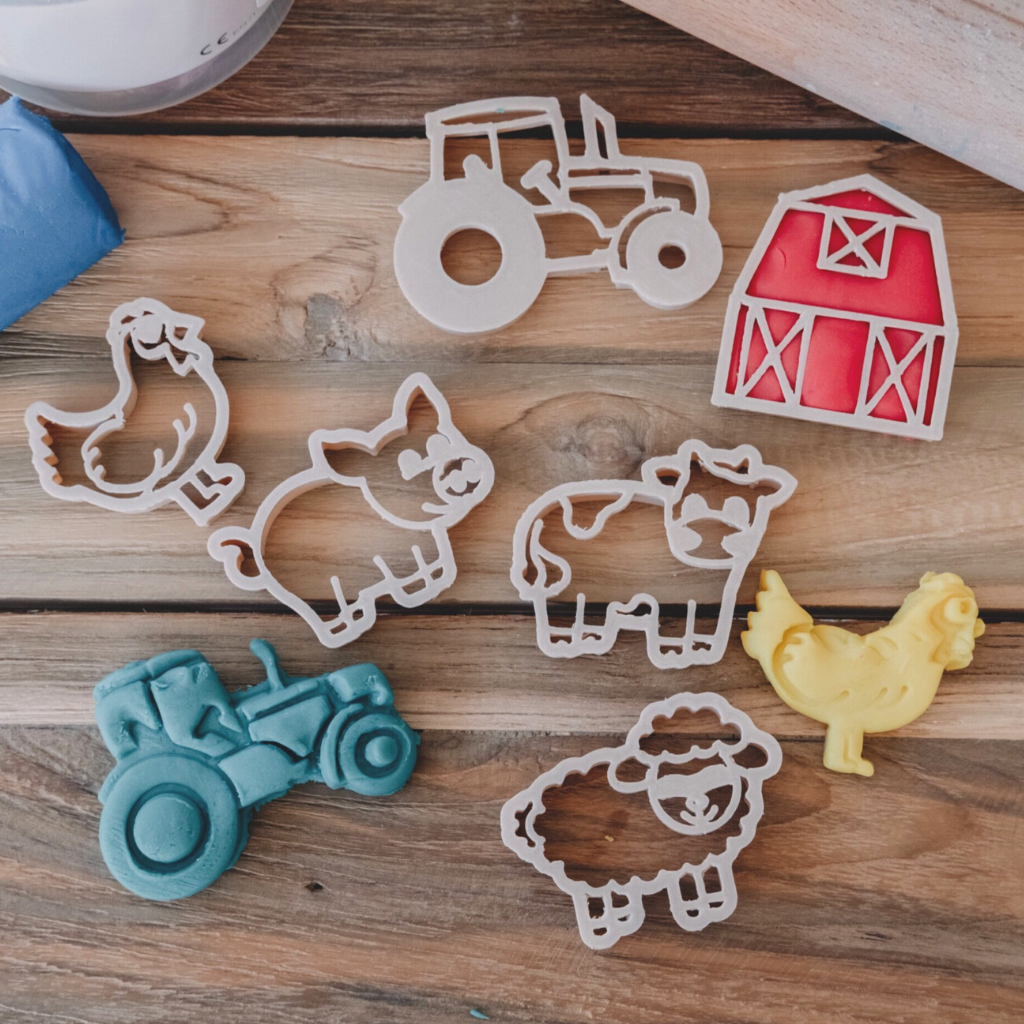 A popular Farm Eco Cutter set for your little ones. Includes Tractor, farm barn, Cow, Sheep, Pig and Chicken eco friendly play dough cutters from Kinfolk Pantry.