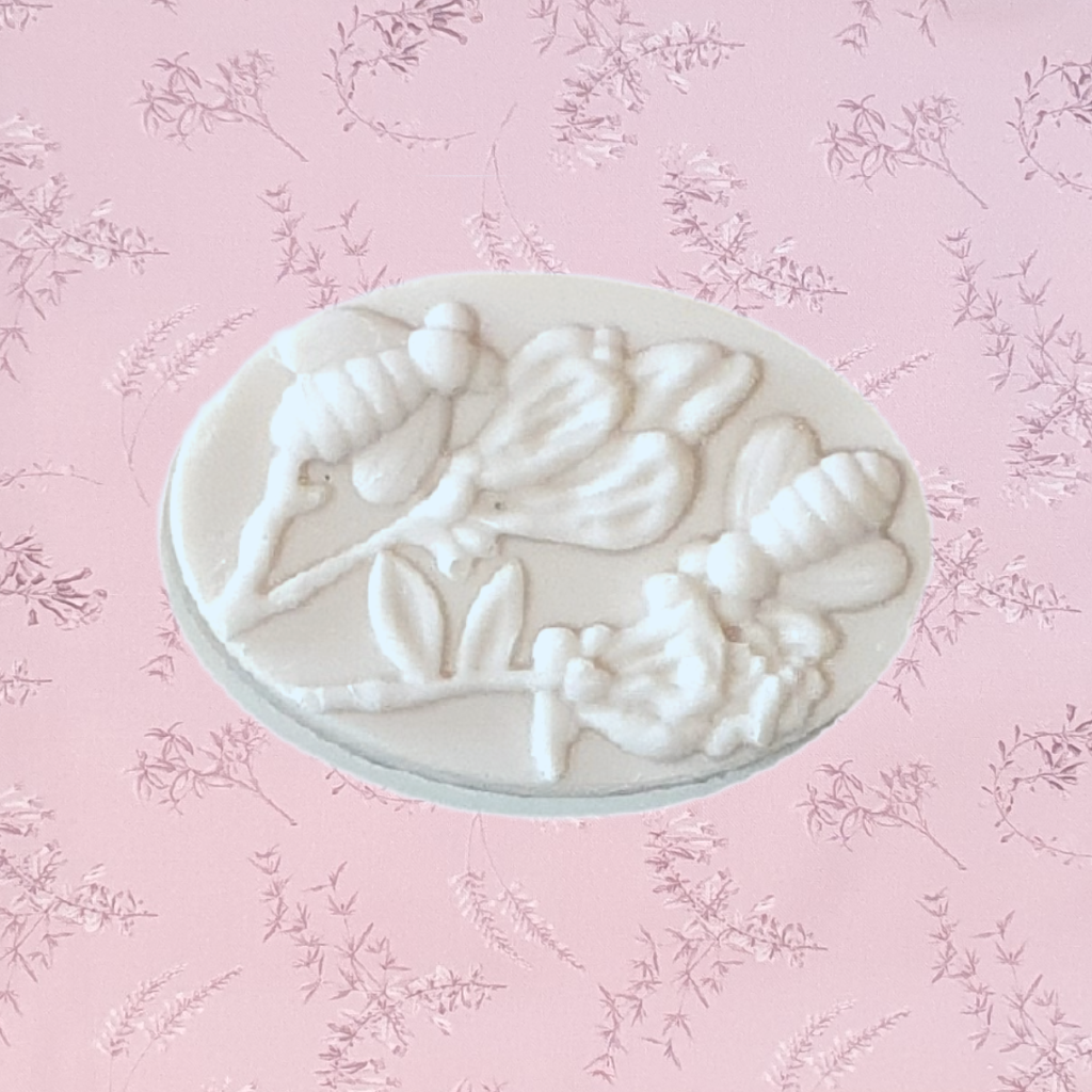 Honey bee soaps are a great gift for her. A beautiful small gift for any occasion. Soft honey scented soap in a creamy colour. These honey bee soaps with the 2 bees and 2 flowers design, are exclusive to Twizzle Designs.