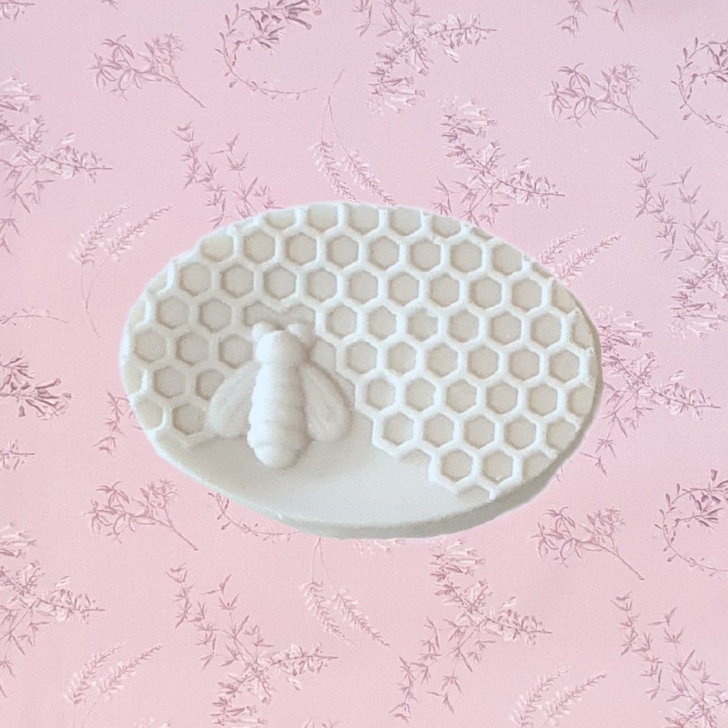 Honey bee soaps are a great gift for her. A beautiful small gift for any occasion. Soft honey scented soap in a creamy colour. These honey bee soaps with the 1 bee and honeycomb design, are exclusive to Twizzle Designs.