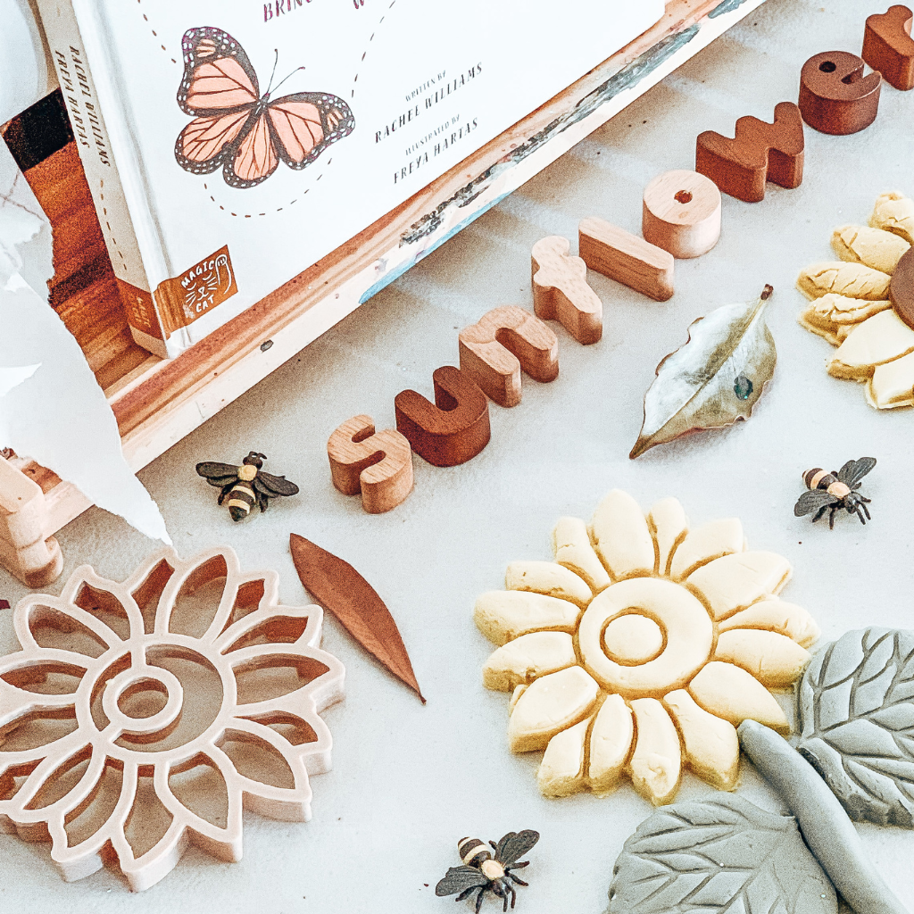 Young child using the Sunflower Large Eco Cutter to discover the plant world. Australian made, all natural Eco Cutters which are biodegradable. Spark your child’s imagination with nature toys, from Kinfolk Pantry.